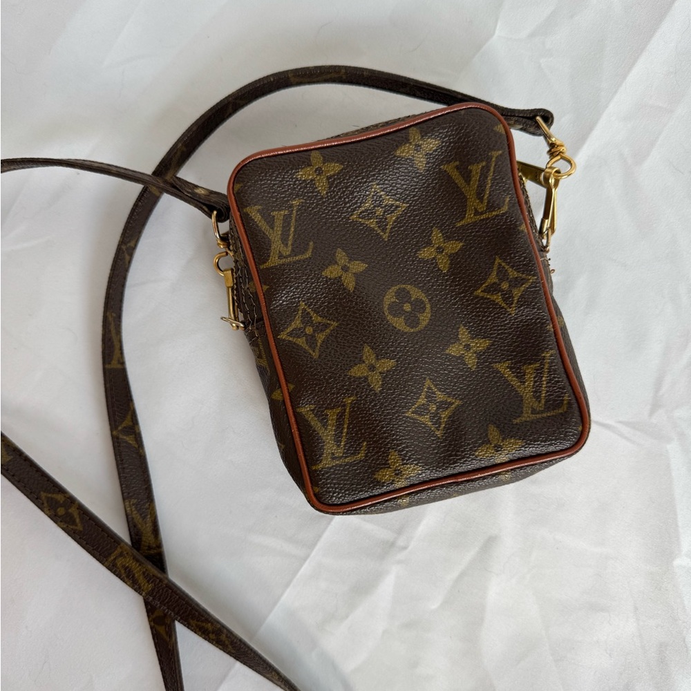 authentic pre-owned Louis Vuitton Monogram Mini Danube crossbody bag